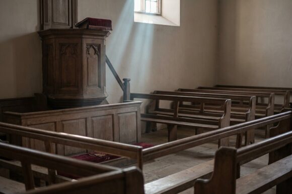 An empty pulpit in an old meetinghouse
