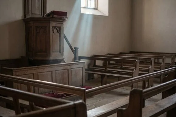 An empty pulpit in an old meetinghouse